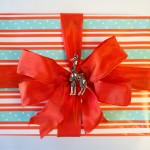 Striped Giftwrap with Orange bow and giraffe detail