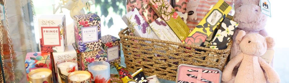 Gifts displayed on glass shelf